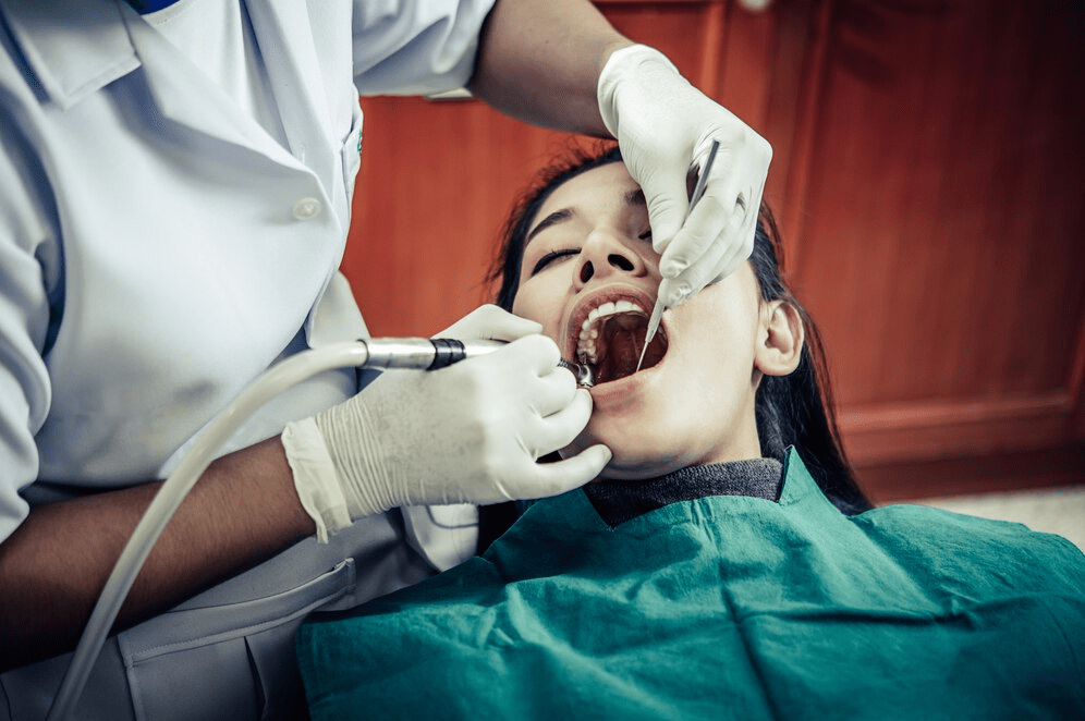 dentists-treat-patients-teeth_1150-19650