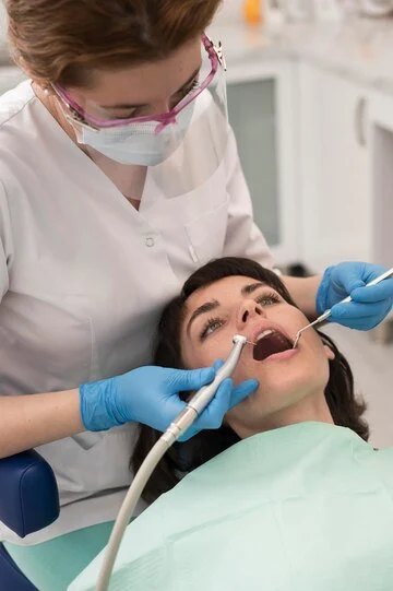 young-female-patient-having-dental-procedure-orthodontist_23-2148985755