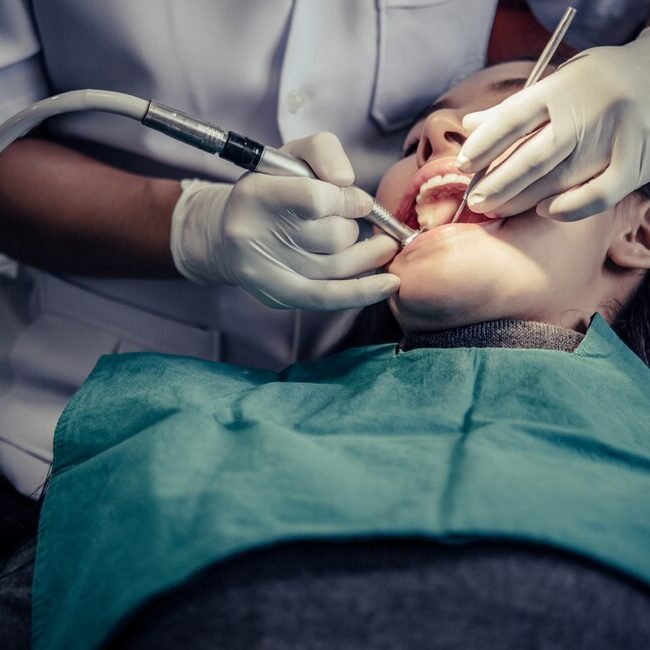 dentists-treat-patients-teeth_1150-19648